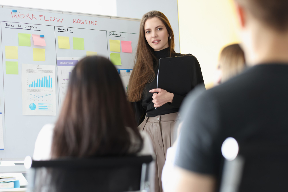 female-trainer-group-leader-conducts-training-seminar