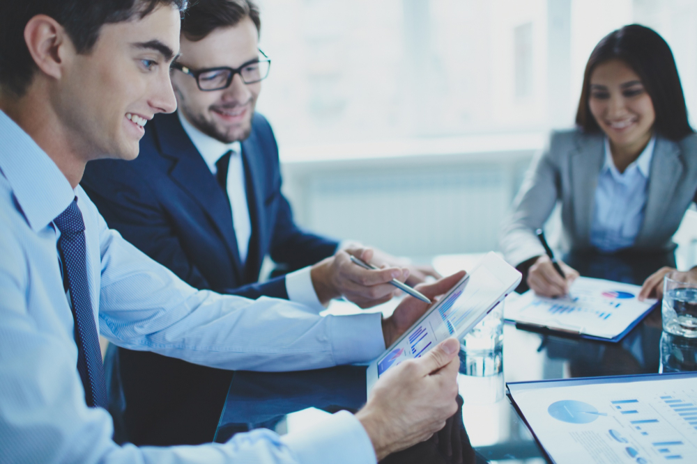 co-workers-reviewing-reports