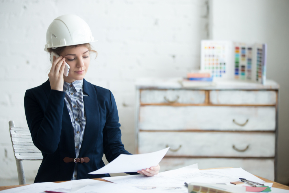 woman-talking-on-mobile-with-helmet