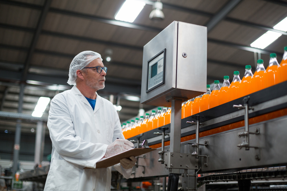 factory-engineer-maintaining-record-on-clipboard-in-factory