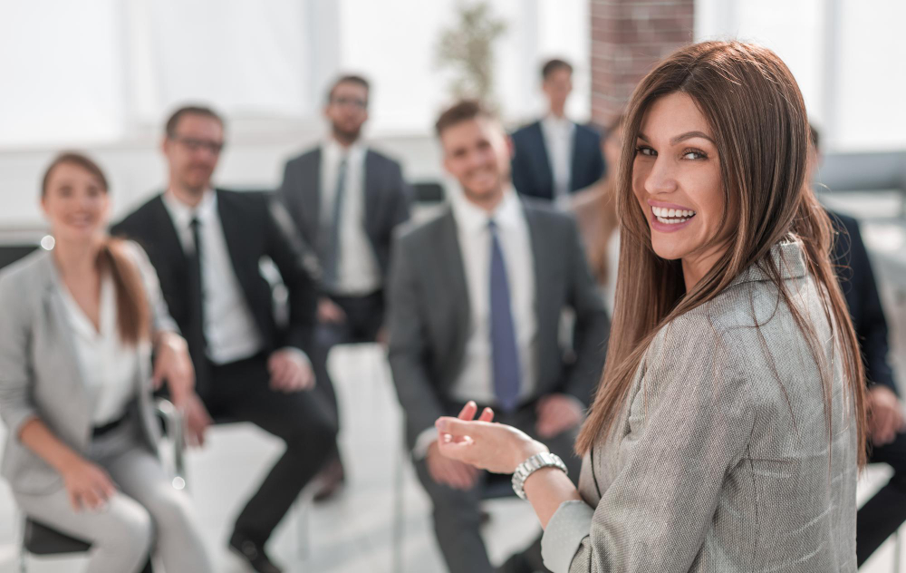 rear-view-business-woman-makes-report-for-the-business-teamphoto-with-copy-space