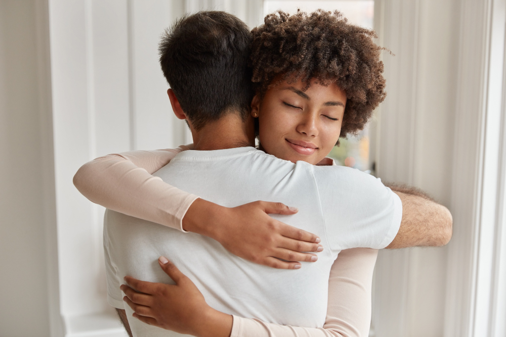 back-view-caucasian-guy-embraces-her-girlfriend-stand-closely-each-other-express-love-support-comfort-express-empathy-have-good-relations-people-care-relationship-concept