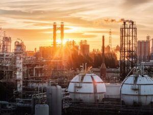 gas-storage-sphere-tanks-petrochemical-industry-oil-gas-refinery-plant-evening-manufacturing-petroleum-industrial-plant-with-gas-column-smoke-stacks-sunset-sky