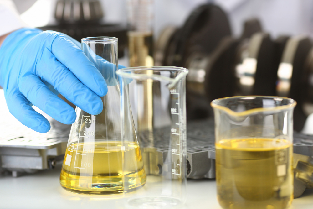 male-hands-protective-gloves-hold-test-tube