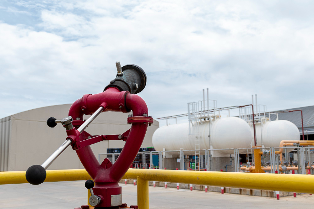 close-up-fire-sprinkler-with-fuel-oil-tank-background