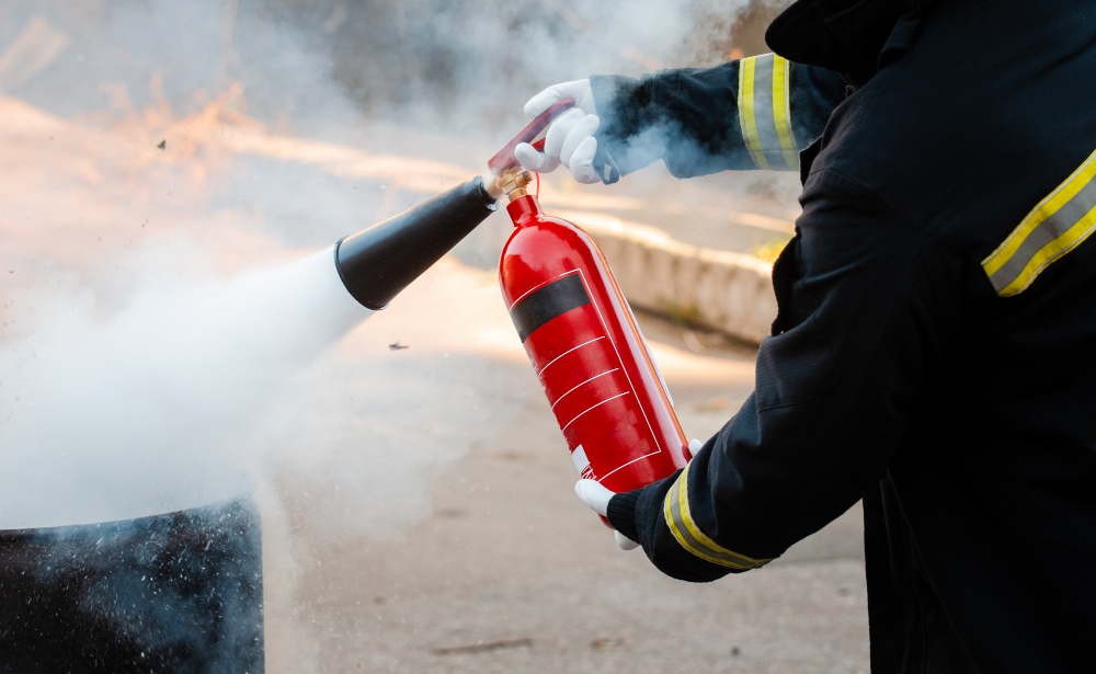 man-conducts-exercises-with-fire-extinguisher-fire-extinguishing-concept-fire-emergency-incident