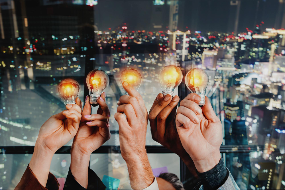 teamwork-and-brainstorming-concept-with-businessmen-that-share-an-idea-with-lamp