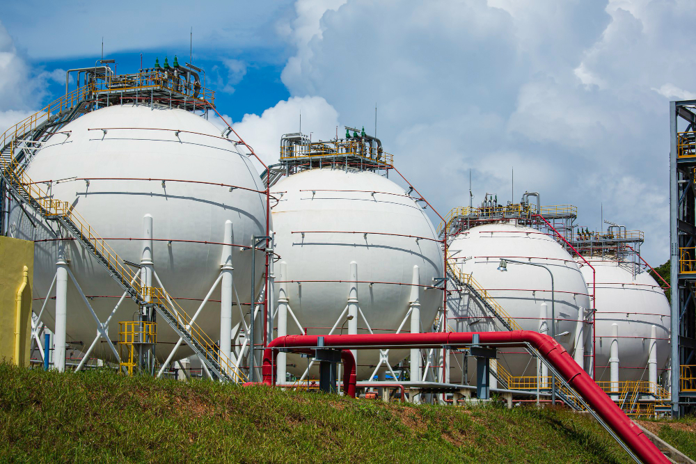 white-spherical-propane-tanks-containing-fuel-gas-background-blue-sky