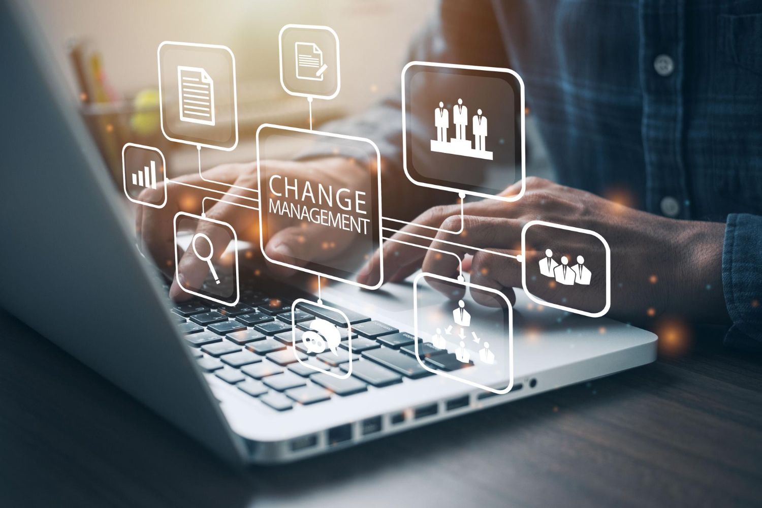 businessman-using-computer-to-document-change-management